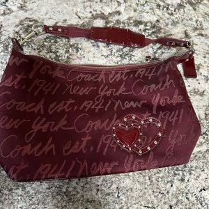 Coach maroon cloth handbag.  Excellent condition.